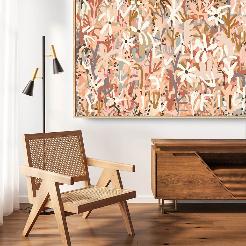 Wooden armchair with wicker backrest in a room with a decorative painting on the wall. canvas print